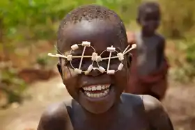 Money CANT buy happiness - Poor Negro Kid Enjoying Playing